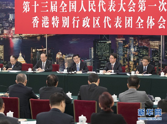 3月6日，中共中央政治局常委、中央书记处书记王沪宁参加十三届全国人大一次会议香港代表团的审议。 新华社记者王晔摄.jpg